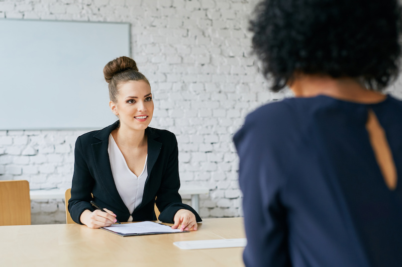 Recruiter asking questions - job interview concept