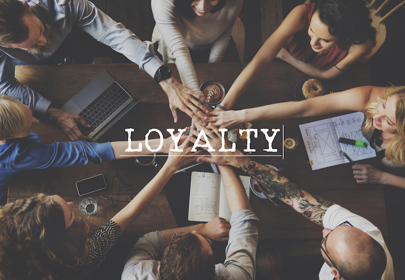 Loyalty Honesty Trust Sincerity Concept employees stacking hands, group