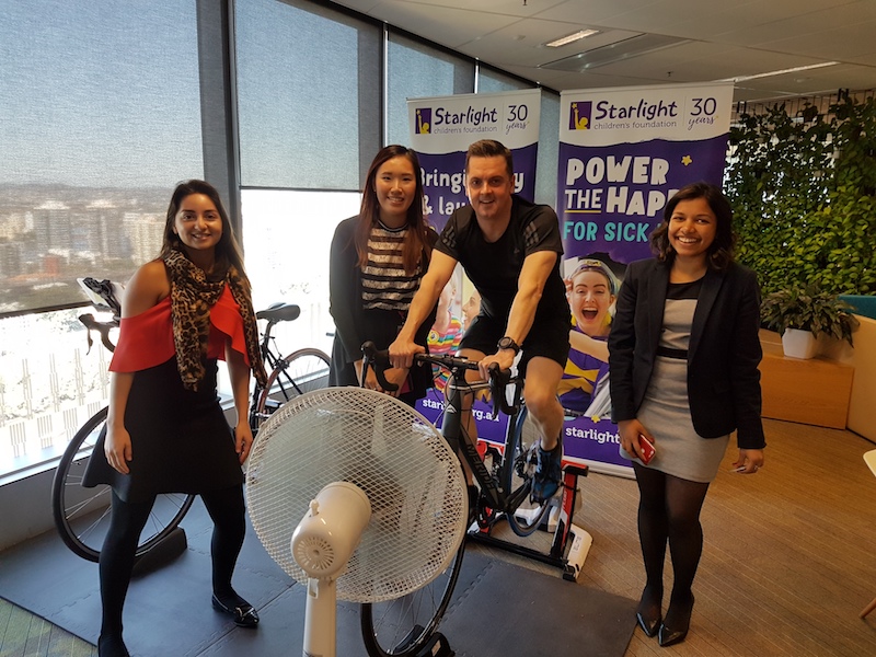 PwC team on bike Tour de Office