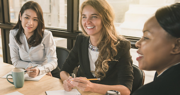 businesswoman having a meeting with international team, diverse female leader concept, banner size