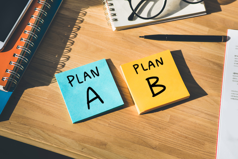Two post-it notes with "plan A" and "plan B" written on them