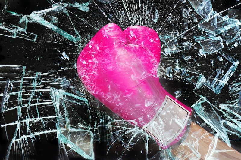 Pink boxing glove Breaking Glass woman glass ceiling